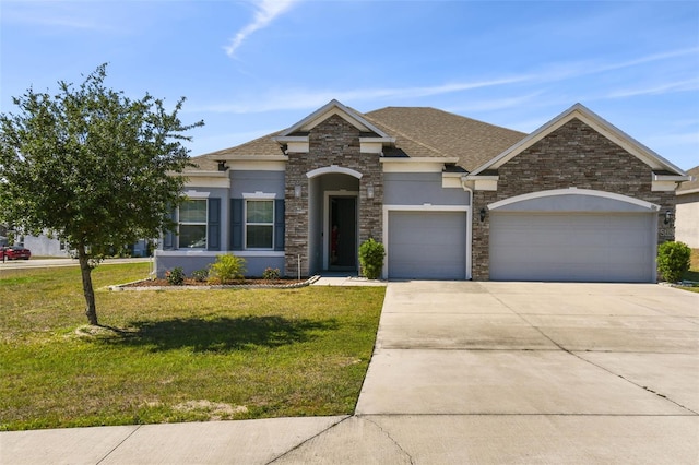 view of front of home featuring a shingled roof, an attached garage, a front lawn, stucco siding, and concrete driveway