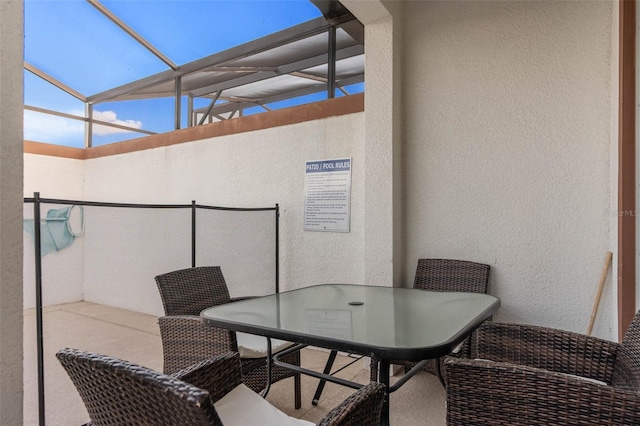 balcony with outdoor dining area