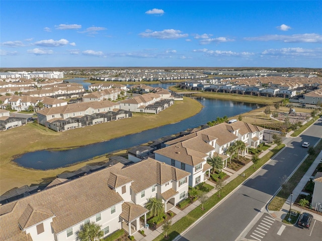 aerial view with a water view and a residential view