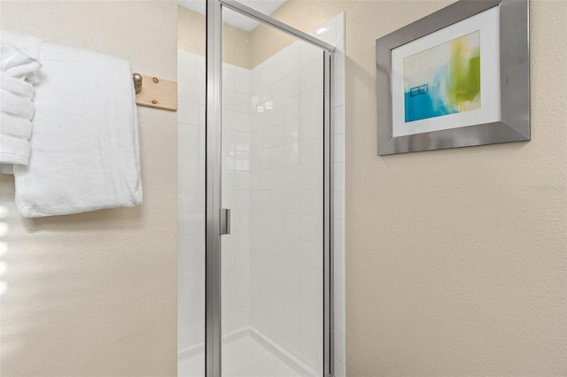 bathroom with a stall shower