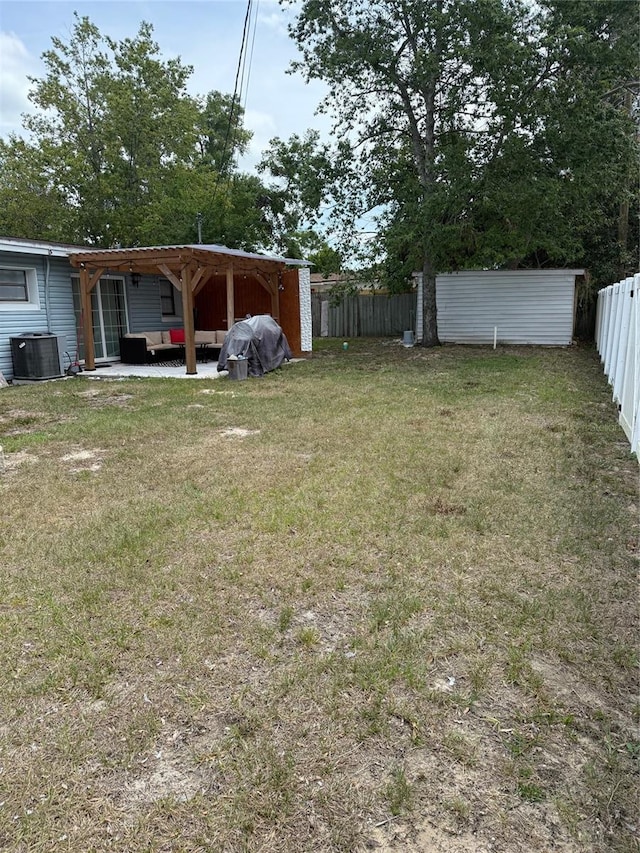 1238 Lakecrest Dr, Apopka, FL 32703 - view of yard featuring outdoor lounge area, central AC, and a patio