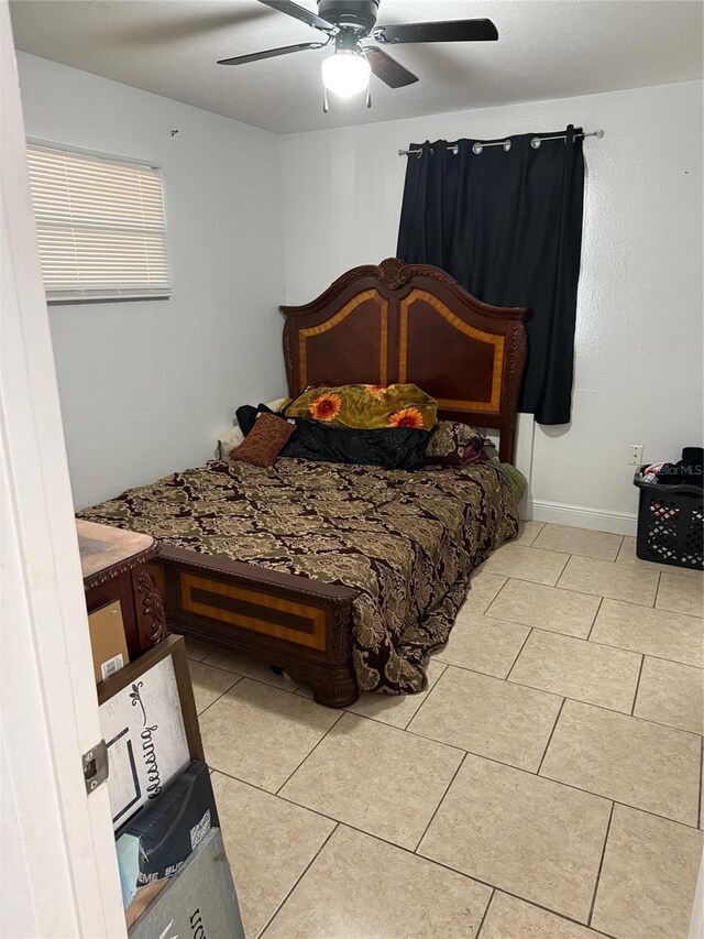 1238 Lakecrest Dr, Apopka, FL 32703 - bedroom with a ceiling fan and light tile patterned flooring