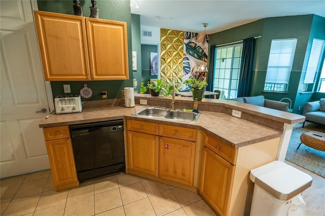 kitchen with visible vents, a peninsula, light tile patterned flooring, a sink, and dishwasher
