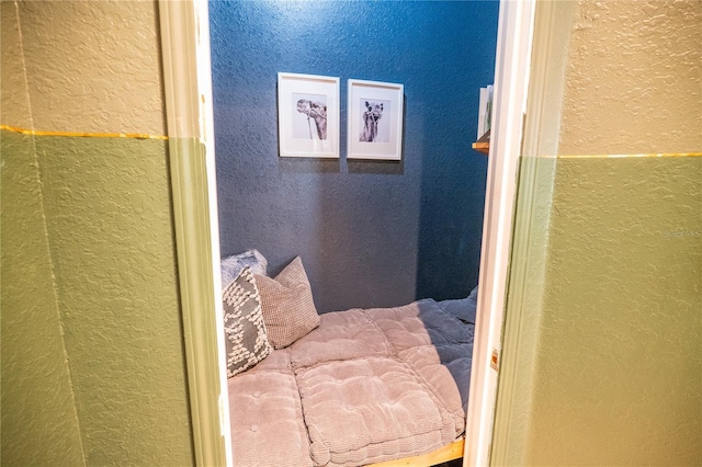interior space with a textured wall