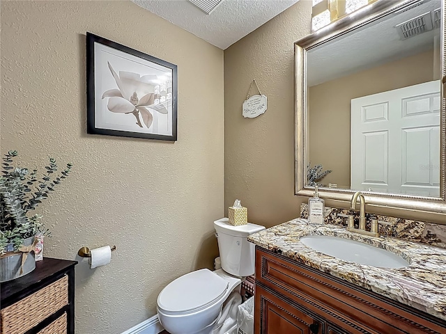 3008 Sutton Woods Dr, Plant City, FL 33566 - half bathroom featuring toilet, a textured wall, visible vents, and vanity