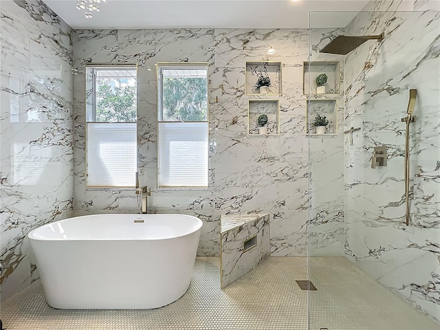 3008 Sutton Woods Dr, Plant City, FL 33566 - full bath with a freestanding tub, stone wall, and a marble finish shower