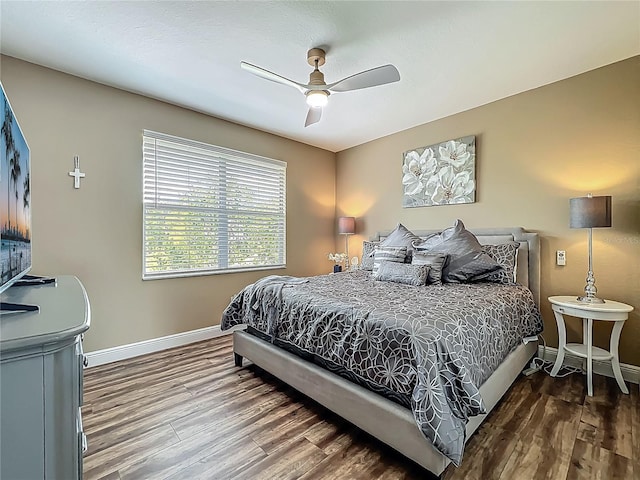 3008 Sutton Woods Dr, Plant City, FL 33566 - bedroom featuring baseboards, ceiling fan, and wood finished floors