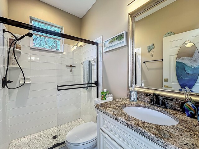 3008 Sutton Woods Dr, Plant City, FL 33566 - bathroom with vanity, a stall shower, and toilet
