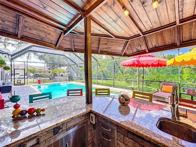 3008 Sutton Woods Dr, Plant City, FL 33566 - view of patio with a sink, glass enclosure, and an outdoor pool