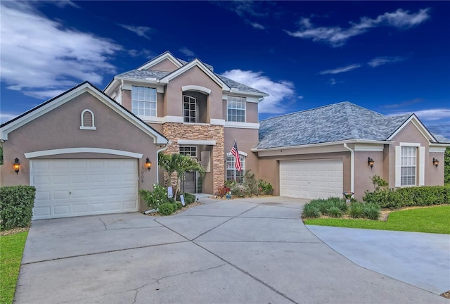 3008 Sutton Woods Dr, Plant City, FL 33566 - traditional-style house featuring concrete driveway, a garage, stone siding, and stucco siding