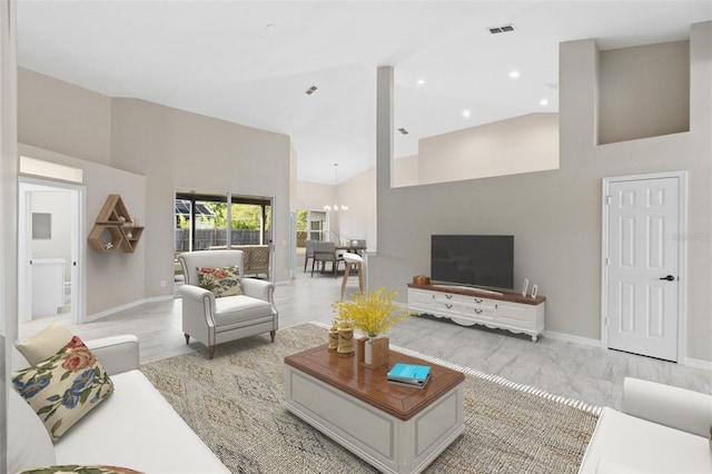 9885 Montclair Cir, Apopka, FL 32703 - living area featuring visible vents, high vaulted ceiling, baseboards, a chandelier, and recessed lighting