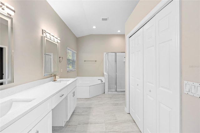 9885 Montclair Cir, Apopka, FL 32703 - full bathroom featuring a sink, marble finish floor, a shower stall, a bath, and a closet