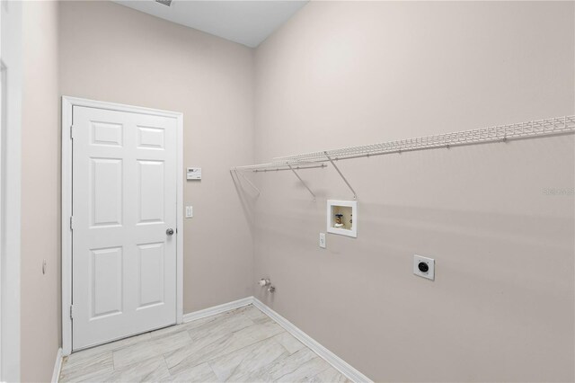 9885 Montclair Cir, Apopka, FL 32703 - washroom featuring baseboards, hookup for an electric dryer, laundry area, and hookup for a washing machine