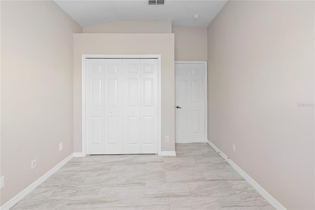 9885 Montclair Cir, Apopka, FL 32703 - unfurnished bedroom with baseboards, visible vents, a closet, and marble finish floor