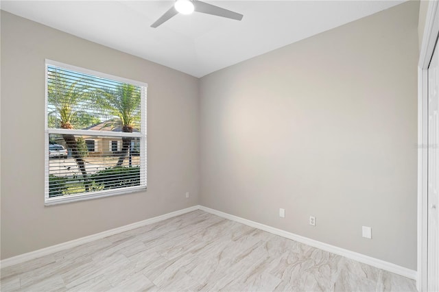 9885 Montclair Cir, Apopka, FL 32703 - spare room with baseboards and ceiling fan