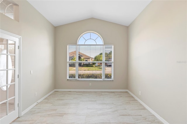 9885 Montclair Cir, Apopka, FL 32703 - empty room featuring baseboards, lofted ceiling, and marble finish floor