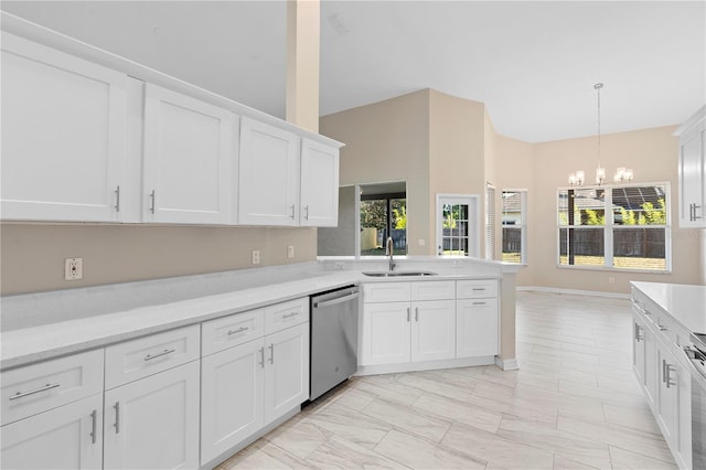 9885 Montclair Cir, Apopka, FL 32703 - kitchen with light countertops, a notable chandelier, a sink, and dishwasher