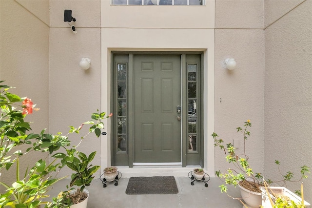 2658 Palmetto Ridge Cir, Apopka, FL 32712 - view of exterior entry with stucco siding