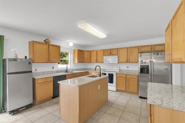 2658 Palmetto Ridge Cir, Apopka, FL 32712 - kitchen featuring white appliances, a sink, a center island with sink, and light tile patterned flooring