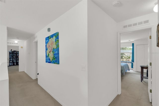 2658 Palmetto Ridge Cir, Apopka, FL 32712 - corridor with light colored carpet and baseboards