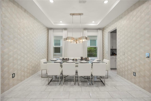 9567 Meadow Hunt Way, Winter Garden, FL 34787 - dining area featuring recessed lighting, baseboards, wallpapered walls, and a raised ceiling