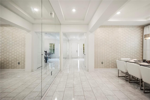 9567 Meadow Hunt Way, Winter Garden, FL 34787 - interior space featuring a raised ceiling, baseboards, wallpapered walls, an accent wall, and recessed lighting