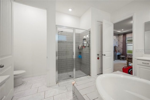 9567 Meadow Hunt Way, Winter Garden, FL 34787 - bathroom with vanity, a shower stall, toilet, and a tub to relax in