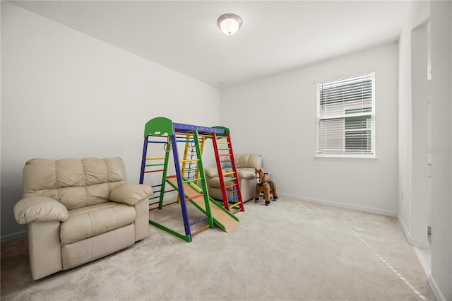 9567 Meadow Hunt Way, Winter Garden, FL 34787 - rec room with baseboards and carpet
