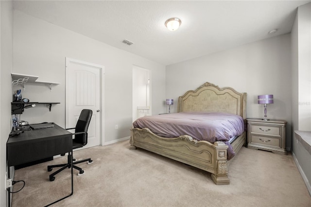 9567 Meadow Hunt Way, Winter Garden, FL 34787 - bedroom with baseboards, visible vents, light carpet, and ensuite bathroom