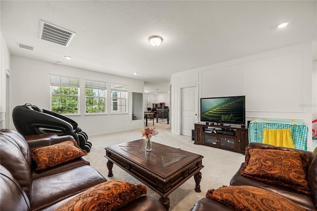 9567 Meadow Hunt Way, Winter Garden, FL 34787 - living room featuring recessed lighting, visible vents, and light carpet