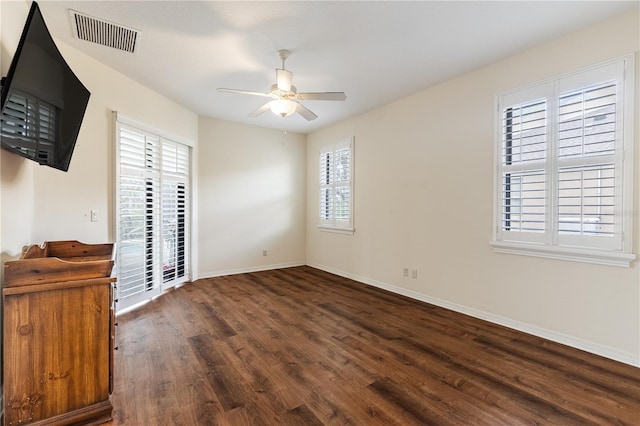 27127 Stoney Brook Dr, Leesburg, FL 34748 - empty room featuring ceiling fan, wood finished floors, and baseboards