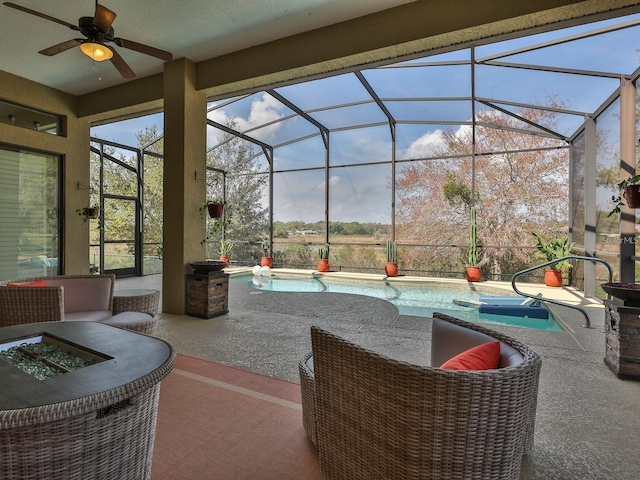 27127 Stoney Brook Dr, Leesburg, FL 34748 - view of patio featuring a ceiling fan, glass enclosure, and an outdoor pool