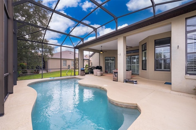 27127 Stoney Brook Dr, Leesburg, FL 34748 - outdoor pool with a patio, ceiling fan, and glass enclosure