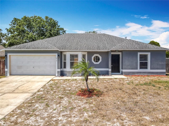 ranch-style home featuring a garage, roof with shingles, stucco siding, and concrete driveway
