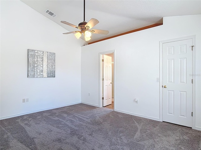 unfurnished room with visible vents, lofted ceiling, baseboards, ceiling fan, and carpet flooring