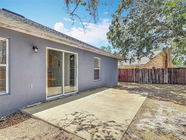 view of patio with fence