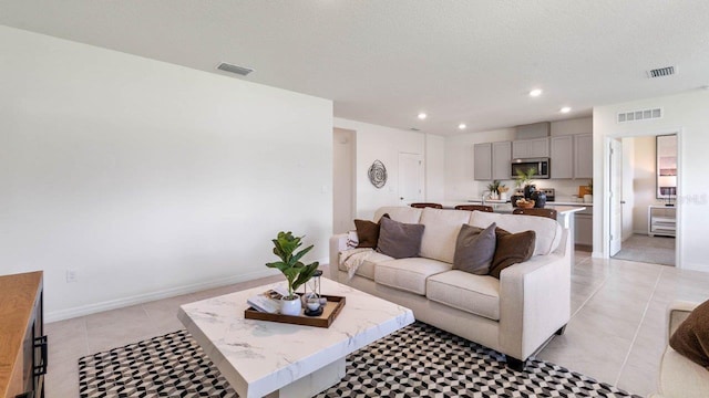 4582 Boxwood Way, Mount Dora, FL 32757 - living area with visible vents, recessed lighting, and light tile patterned flooring