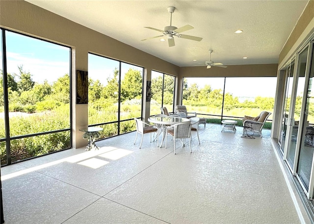 871 Iron Oak Way, The Villages, FL 32163 - unfurnished sunroom with plenty of natural light, recessed lighting, and ceiling fan