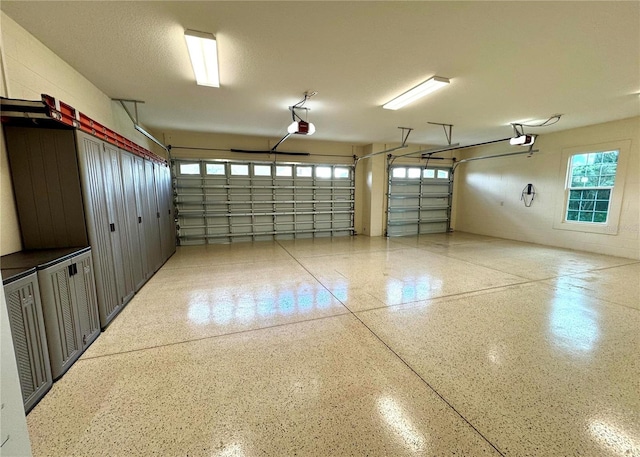 871 Iron Oak Way, The Villages, FL 32163 - garage featuring a garage door opener