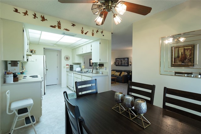 9 Buck Cir Unit 9, Haines City, FL 33844 - dining space featuring ceiling fan, visible vents, and light floors