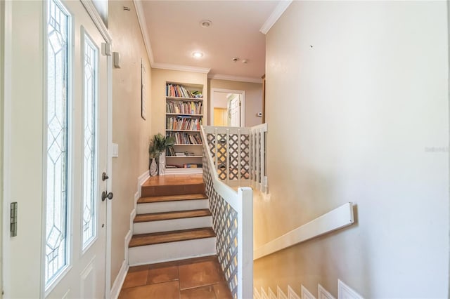 stairway featuring crown molding, baseboards, and recessed lighting
