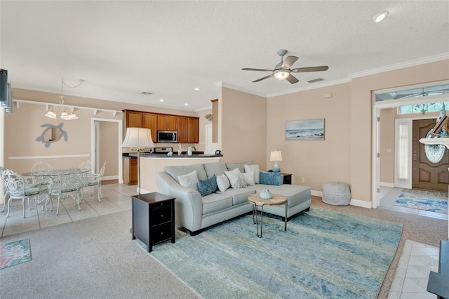 living area featuring ceiling fan, light carpet, a chandelier, baseboards, and light tile patterned flooring