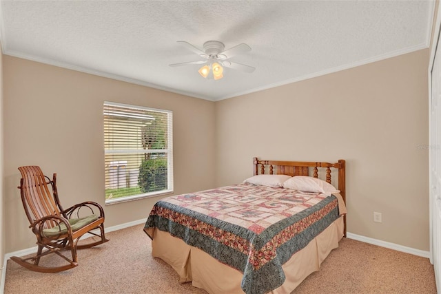 bedroom featuring light carpet, crown molding, a textured ceiling, baseboards, and ceiling fan