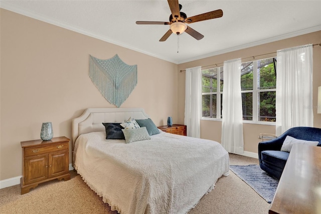 bedroom with baseboards, light carpet, ornamental molding, and ceiling fan