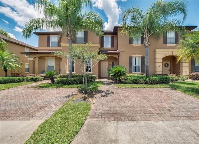 416 Calabria Ave, Davenport, FL 33897 - view of front facade featuring stucco siding
