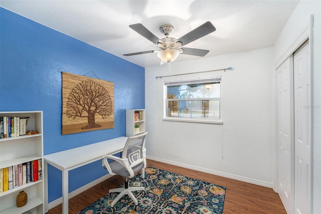 6801 16th St N, Saint Petersburg, FL 33702 - office featuring baseboards, wood finished floors, and a ceiling fan