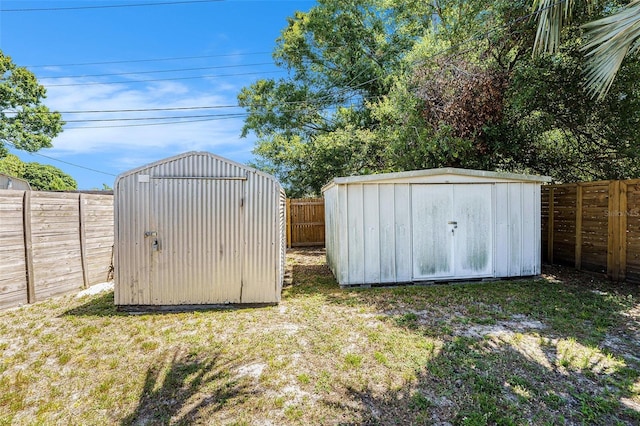 6801 16th St N, Saint Petersburg, FL 33702 - view of shed featuring a fenced backyard