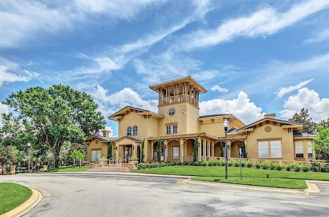 114 Vista Verdi Cir Unit 136, Lake Mary, FL 32746 - view of front of home with stucco siding and a front yard