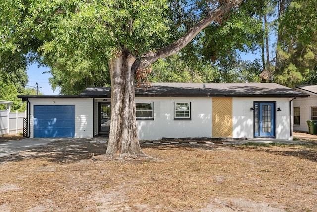 2014 10th St NW, Winter Haven, FL 33881 - ranch-style house with a garage and concrete driveway