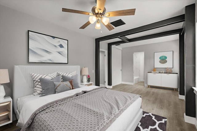 2014 10th St NW, Winter Haven, FL 33881 - bedroom featuring a ceiling fan, baseboards, visible vents, and wood finished floors